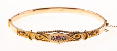 An antique ruby and diamond hinged bangle, possibly late Victorian/early Edwardian,