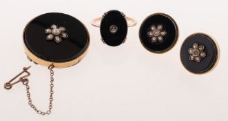 A small collection of antique mourning jewellery, including a ring,