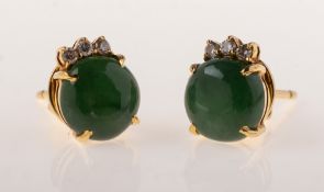 A pair of jade and diamond stud earrings,