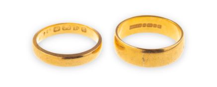 Two 22ct gold wedding bands, sizes O to O1/2 and M to M1/2, UK hallmarks, total gross weight 11.