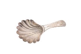 A George III silver caddy spoon, by Hester Bateman, with a shell bowl and an engraved handle,