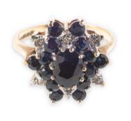 A 1970's 9ct gold sapphire and diamond cluster ring,