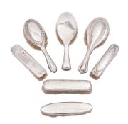 Various silver dressing items, to include three hair brushes (one initialled),