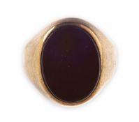 A carnelian set signet ring, of oval form, marked 333, size Q1/2, 4.8grams.
