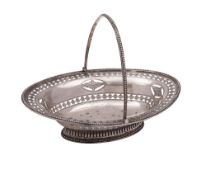 A George III swing-handle silver sweetmeat basket, of navette outline, with bead borders,
