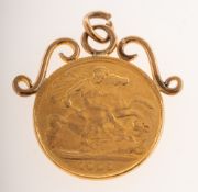 A half sovereign pendant,