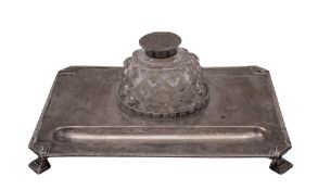 A George V Art-Deco silver inkstand, of canted rectangular form, with an applied border,
