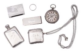 A small mixed lot of silver, to include a vesta on a chain, a matchbox cover, a money clip,