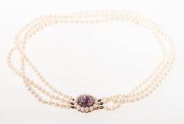A vintage pearl and amethyst necklace, a triple row of cultured pearls, pearls approx. 4.5mm to 5.