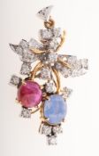A ruby, sapphire and diamond pendant, the 'v' shaped bale set with a single brilliant-cut diamond,