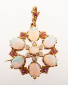 An opal, diamond and ruby brooch pendant, of openwork flowerhead form,