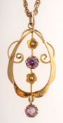 An Art Nouveau pendant with chain, the pendant of openwork and floral form,