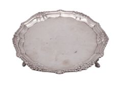 A George III small silver salver, of shaped circular outline,
