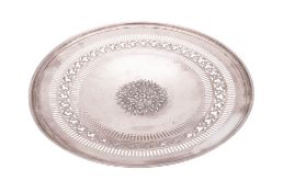 A late 19th/ early 20th century pierced silver dish, circular form,