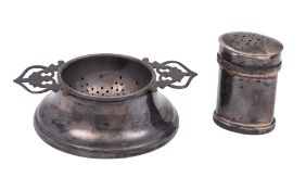 A 20th century silver tea strainer, with twin, pierced handles and its matching base, by Lanson Ltd,