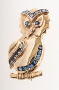 A vintage sapphire and diamond owl brooch,