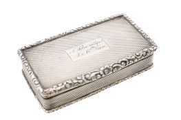 A William IV silver snuff box, of rounded rectangular outline, with raised foliate borders,