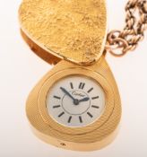 Cartier, an unusual vintage 18ct gold cased Cartier pendant watch with chain, circa 1960's/1970's,