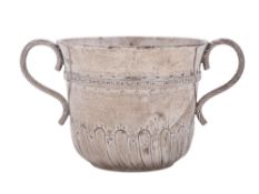 A George V small silver porringer, campana form, with twin rope-work handles,