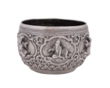 A late 19th/ early 20th century small Burmese silver rice bowl, circular form,