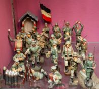 Lineol and Elastolin, an eight piece German army band, together with a campfire group, sentry box,