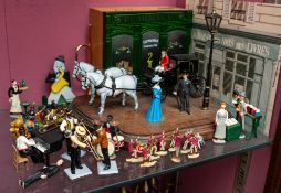 A reproduction die cast jazz quintet together with a flat back band, a diorama street scene,