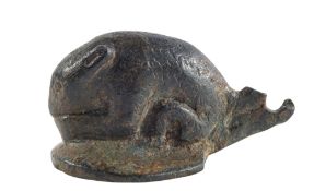 A ROMAN BRONZE MODEL OF A SQUIRREL, CIRCA 2ND CENTURY A.D., probably an oil lamp lid, 3.5cm. high