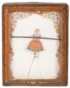 A 19th century sand automaton of a woman on a high wire in a glazed case,