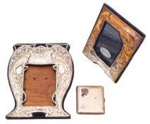 A modern silver photograph frame, shaped rectangular outline,