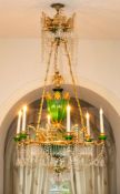 A gilt metal, green and clear glass six light chandelier of Swedish Neoclassical style,