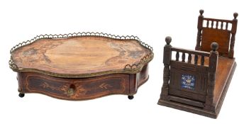 An oak bookslide in Aesthetic Movement taste,