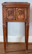 A walnut bedside pot cupboard,