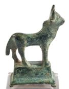 A ROMAN BRONZE MODEL OF A BULL, CIRCA 1ST CENTURY A.D., 5.2cm.