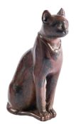 AN EGYPTIAN BRONZE MODEL OF A CAT, LATE PERIOD, 26TH-30TH DYNASTY, CIRCA 664-332 B.C.,