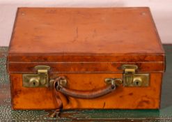 An Edwardian leather vanity case by Drew & Sons, Piccadilly Circus,