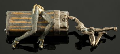 An Elizabeth II novelty parcel-gilt silver pill box, in the form of a bed, with a sliding cover,