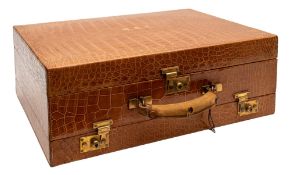 Asprey; a fine tan crocodile leather travelling dressing case;