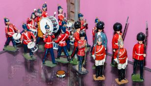 A set of Britain's bandsmen together with lifeguards and beefeaters,