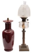 A brass and glass table oil lamp,