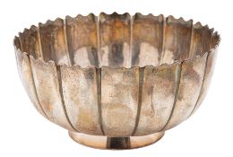 A George I fluted silver dish, shaped circular form, initialled 
