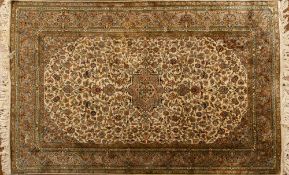 A Persian part silk carpet,