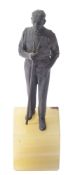 A Continental, probably Austrian bronze and onyx mounted model of a billiards or snooker player,