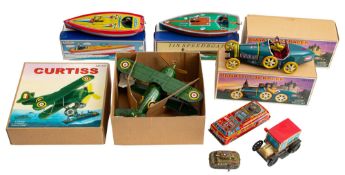 A collection of various Japanese and Chinese tinplate toys, clockwork and friction drive,