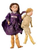 An Armand Marseille bisque head doll, applied brown wig, blue glass sleeping eyes ,