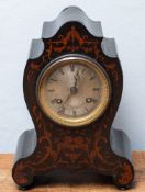 A mid-Victorian French ebonised and marquetry mantel clock having an eight-day duration movement