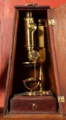 A George III cuff-type brass microscope by William Watkins, James Street London,
