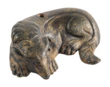 A ROMAN BRONZE MODEL OF A RECUMBENT MOLOSSIAN HOUND, CIRCA 2ND CENTURY A.D.