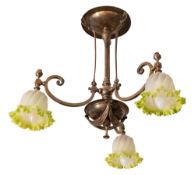 An Art Nouveau style brass and frosted glass three light electrolier,