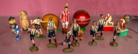Britain's and others, a group of 7 die cast football figures,