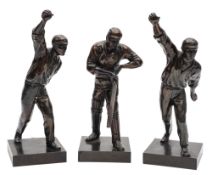 Three patinated metal models of cricketers,